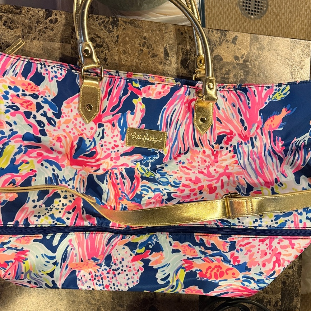 Lilly Pulitzer Vibrant Blue and Pink expandable weekender with Gold Accents